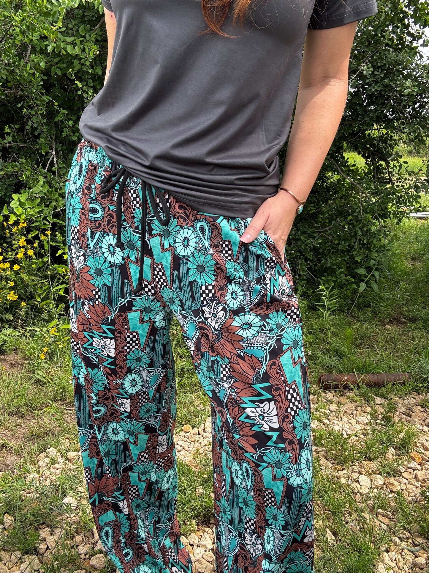 Tattoos In Turquoise Pants