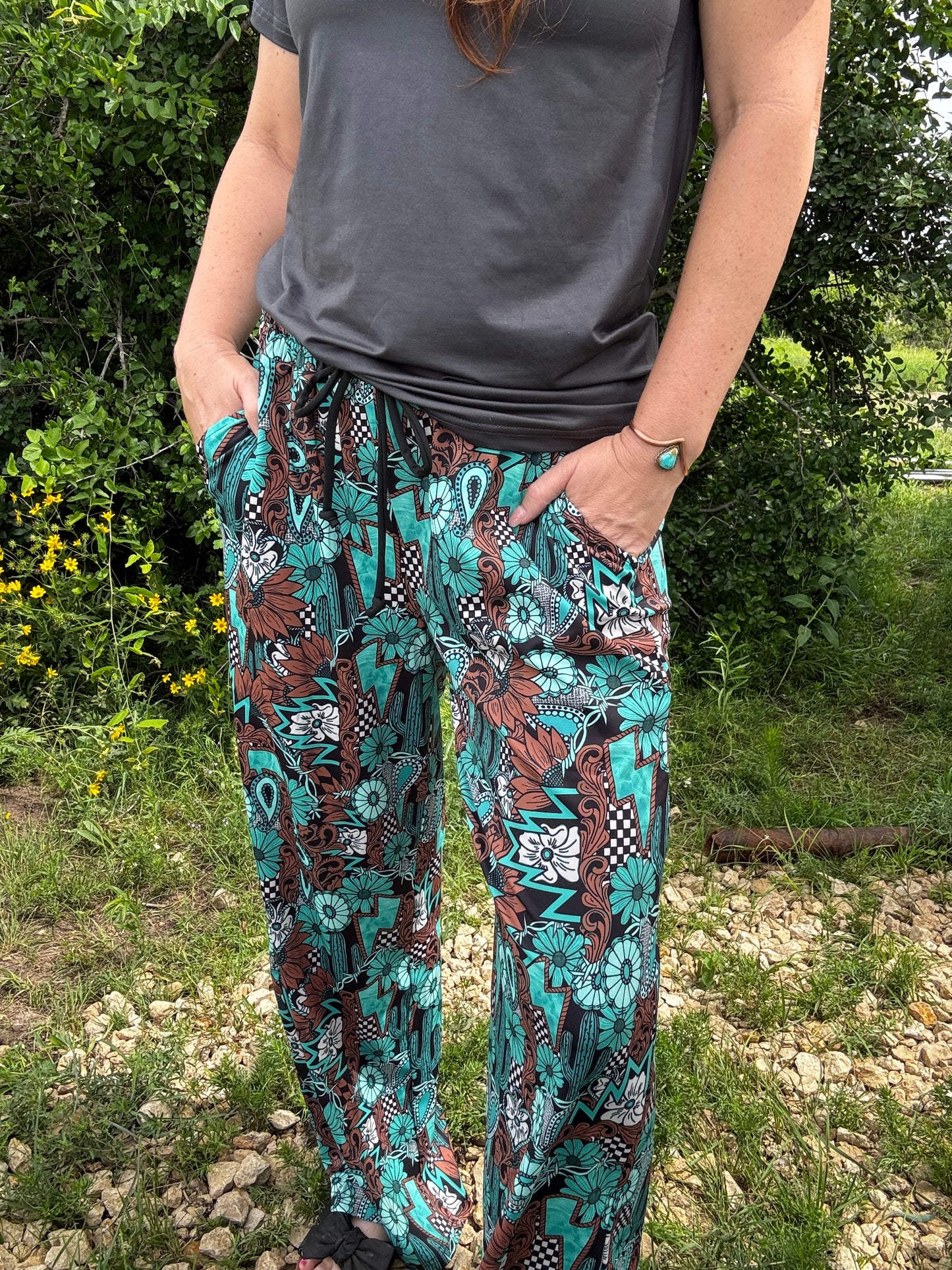 Tattoos In Turquoise Pants