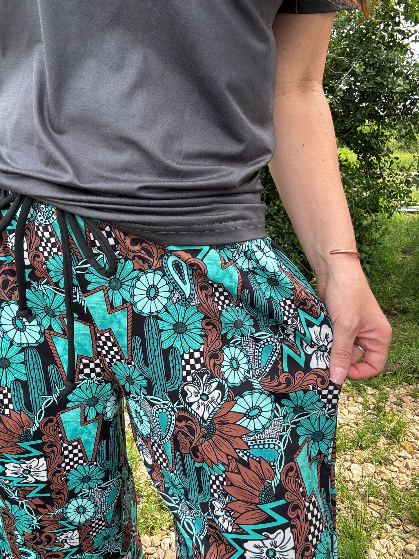 Tattoos In Turquoise Pants