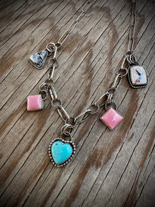 Charm Necklace With Nacozari, Pink Conch, and White Buffalo