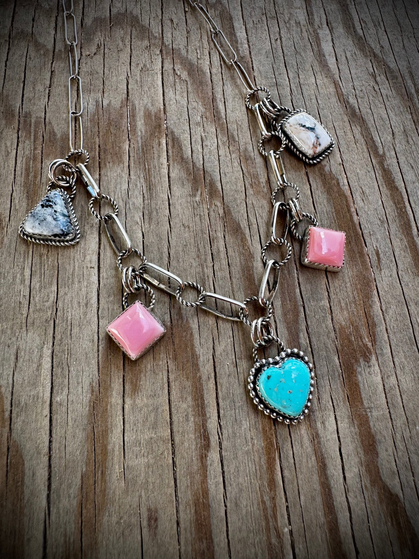 Charm Necklace With Nacozari, Pink Conch, and White Buffalo