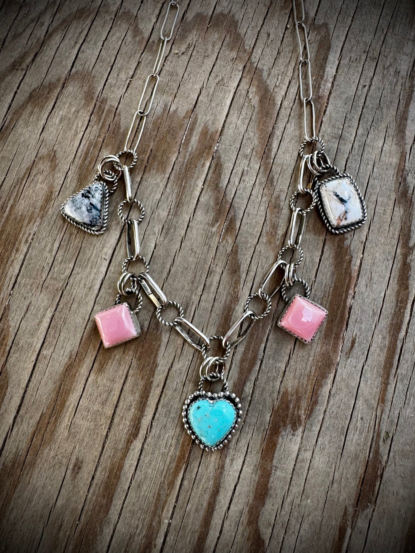 Charm Necklace With Nacozari, Pink Conch, and White Buffalo